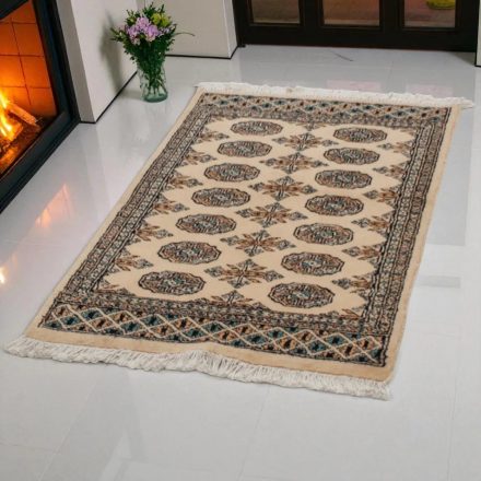 Tapis Pakistan beige Boukhara 76x123 tapis oriental fait main