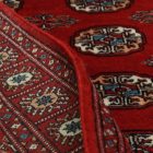 Tapis Pakistan bordeaux Boukhara 92x152 tapis oriental fait main